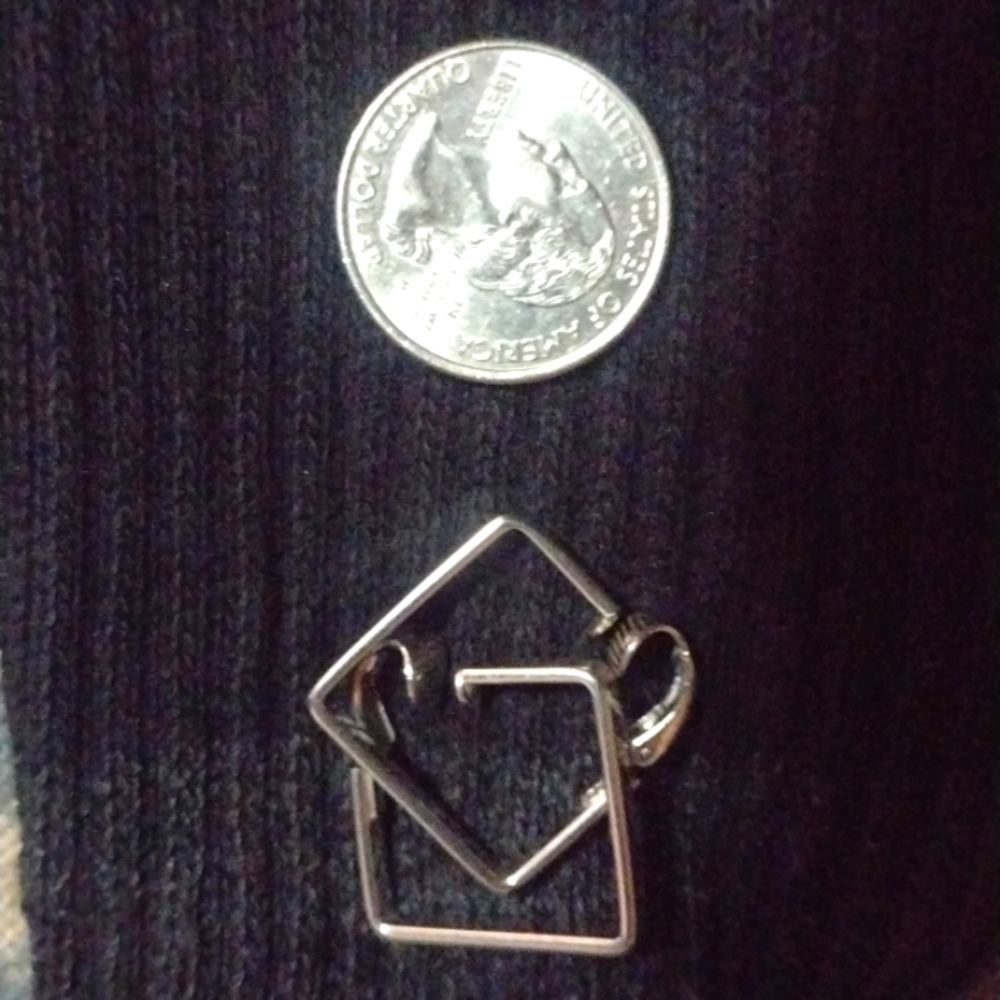 Vintage clip on earrings. Silver in color